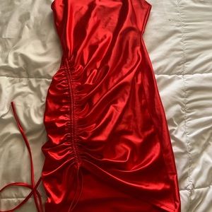 Silky red dress, strings that you can adjust to make tighter or loose